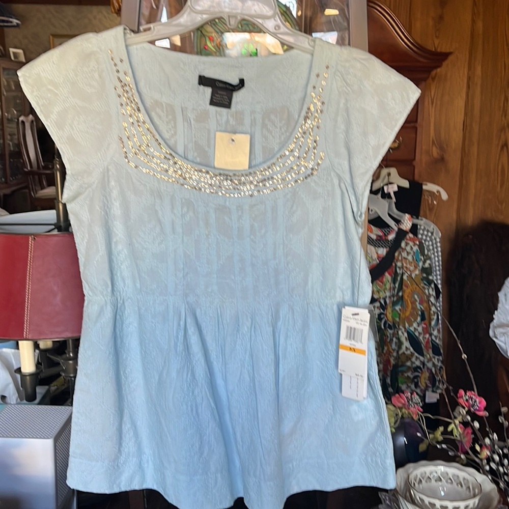 Calvin Klein jeans NWT cute top in light blue  added silver bling at collar